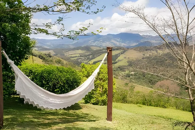 Área externa de Casa de Pedra, Charme e Conforto