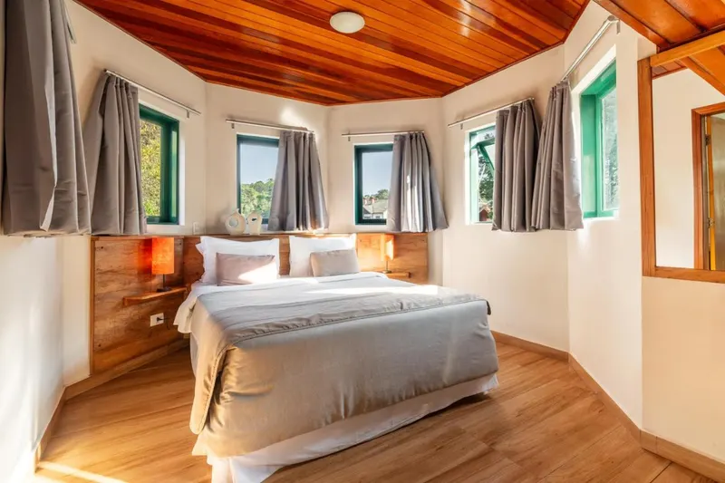Quarto em Castelo Piazzale by Concavus
