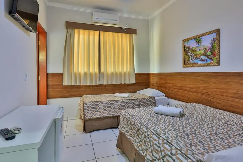 Quarto em Hotel Romaria Aparecida