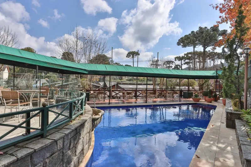 Piscina de Le Suisse Elegance Hotel