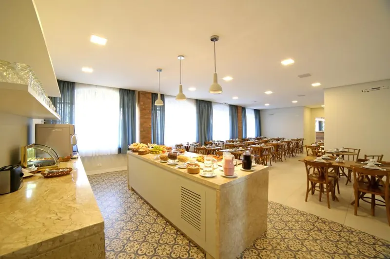 Café da manhã e refeições em Moinho Itália Hotel