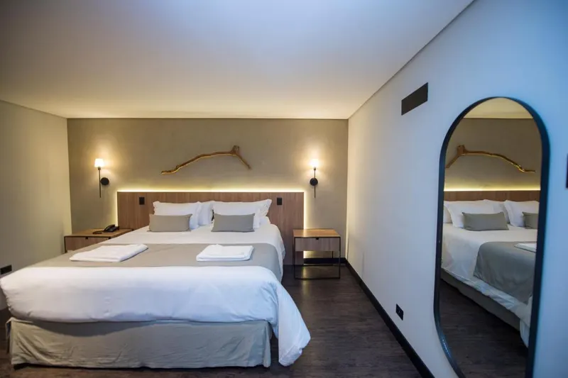 Quarto em Pinot Hotel