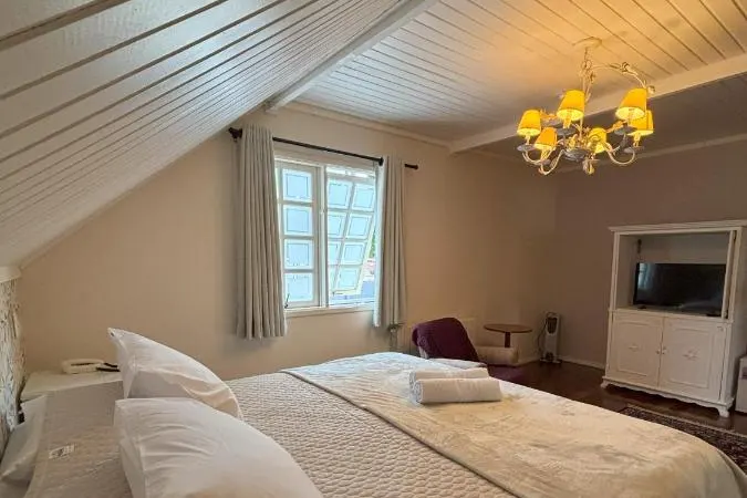Quarto em Pousada Portal das Cerejeiras